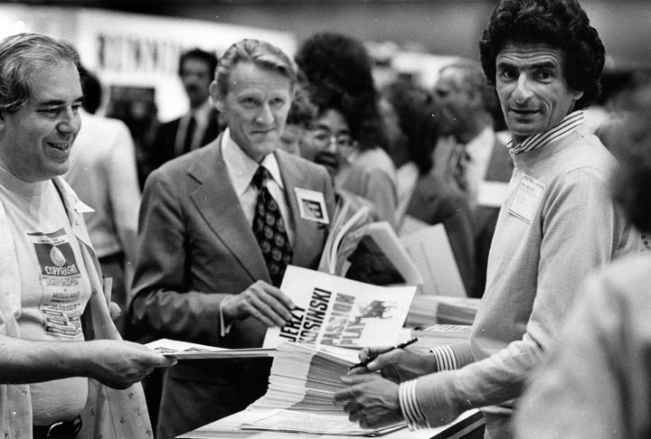 Jerzy Kosinski autographing one of his bestsellers