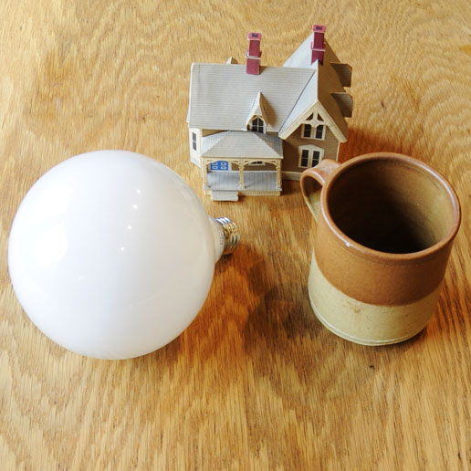 LittleMan's perception from C of lightbulb, mug, and house, but flipped horizontally