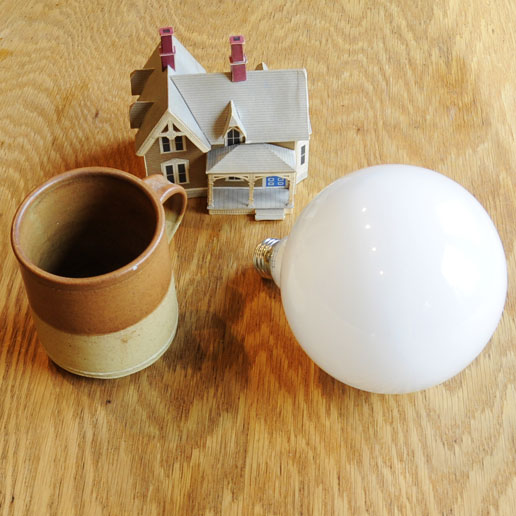 How LittleMan at C views lightbulb, mug, and house
